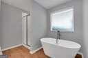 5337 Tolar Rd Unit 61, South Fulton, GA 30213 - bathroom featuring a stall shower and a bathtub