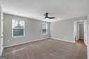 unfurnished room featuring plenty of natural light