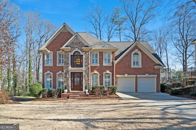 view of front of property featuring a garage