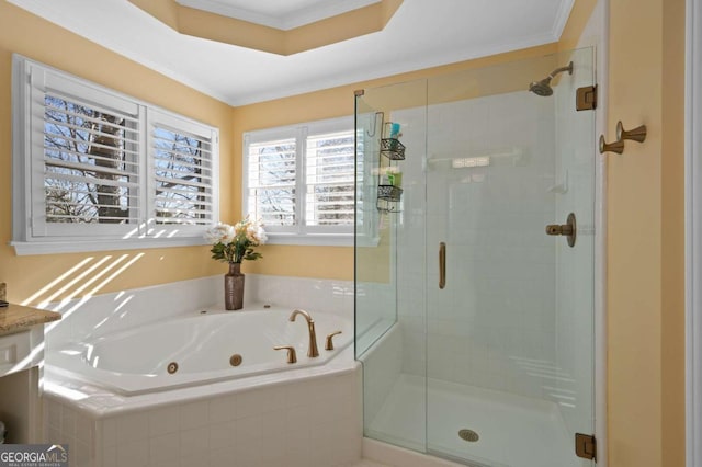 bathroom featuring separate shower and tub, vanity, and ornamental molding