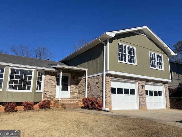 view of front of home with a garage