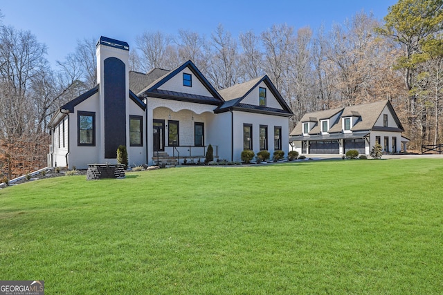 view of front of property with a front lawn and a porch