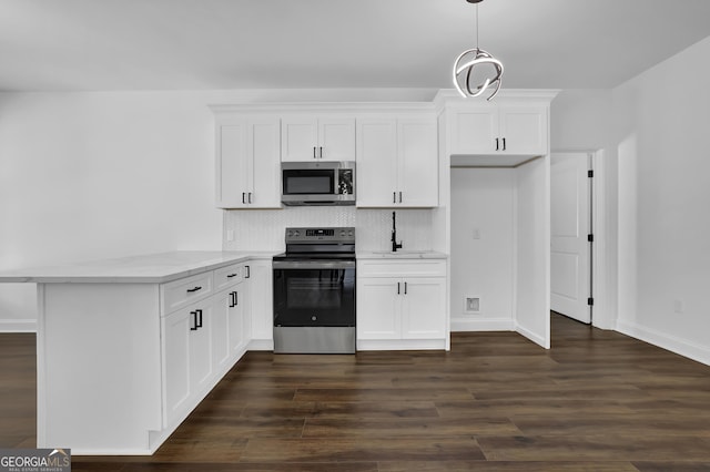 kitchen with white cabinetry and stainless steel appliances