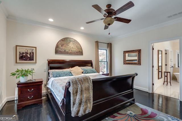 bedroom featuring crown molding, dark wood-type flooring, ceiling fan, and ensuite bathroom