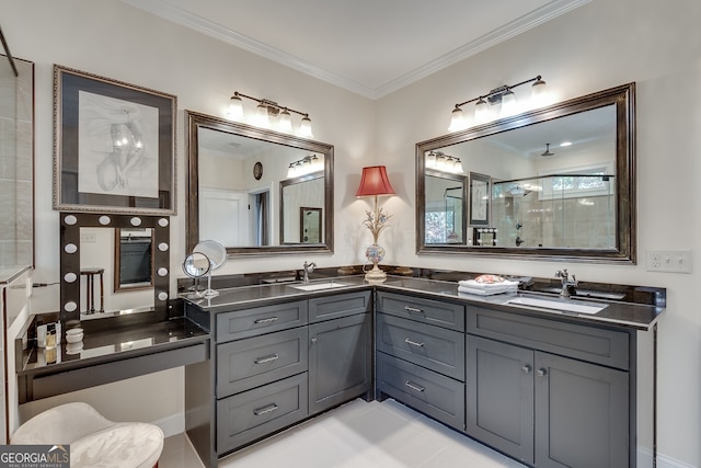 bathroom featuring tile patterned flooring, ornamental molding, an enclosed shower, and vanity