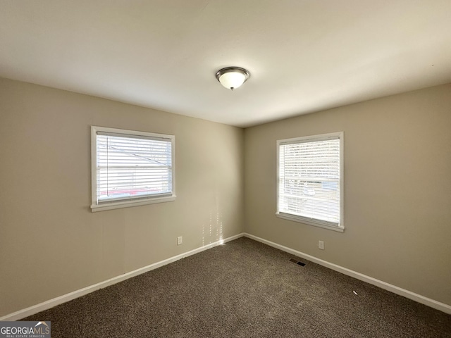 view of carpeted spare room