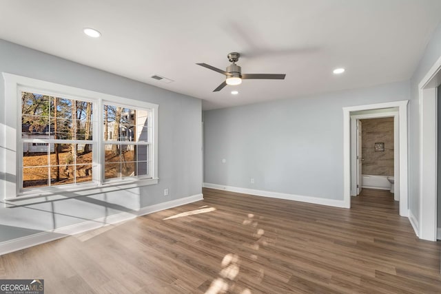 interior space with hardwood / wood-style flooring and ceiling fan