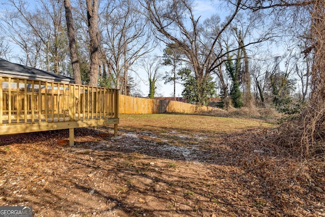 view of yard featuring a deck