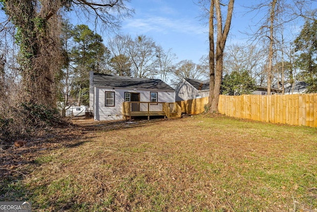 view of yard with a deck