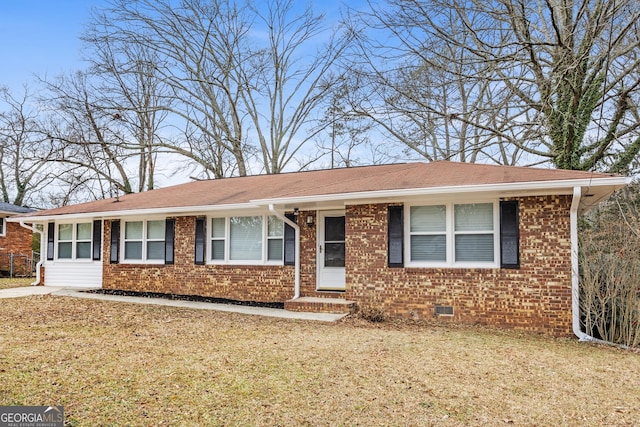 ranch-style home with a front yard