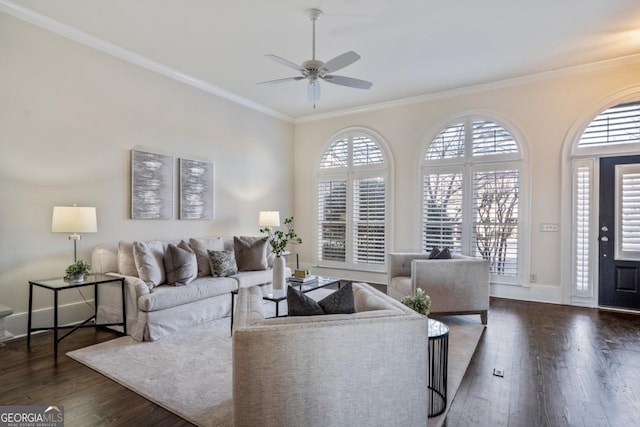 living room featuring crown molding, dark hardwood / wood-style floors, and ceiling fan