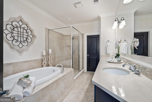 bathroom featuring vanity, tile patterned flooring, ornamental molding, and independent shower and bath