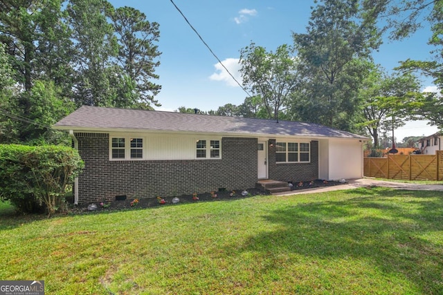 ranch-style house with a front yard