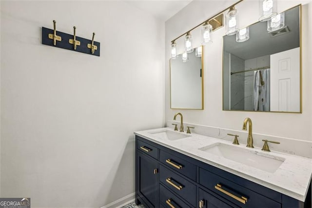 bathroom with vanity and a shower with curtain