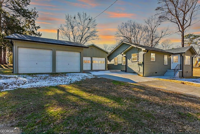 ranch-style house with a yard