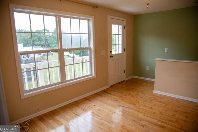 entryway with light hardwood / wood-style flooring