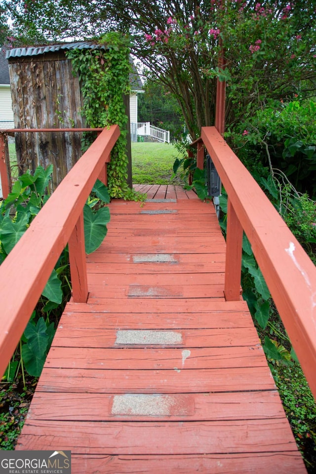 deck featuring a yard