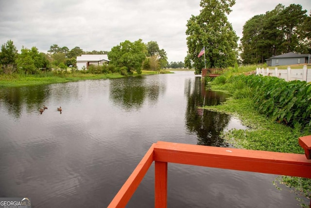 dock area with a water view