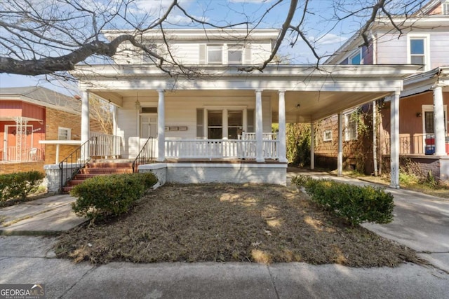 farmhouse-style home featuring a porch