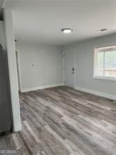 interior space with hardwood / wood-style floors