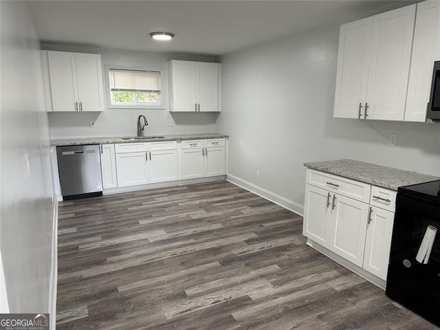 kitchen with sink, stainless steel appliances, and white cabinetry