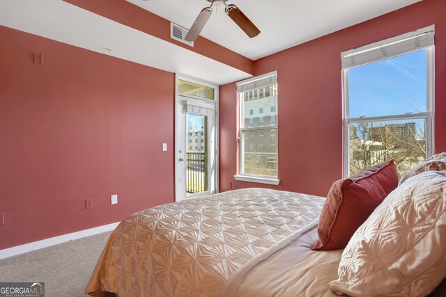 carpeted bedroom with access to exterior and ceiling fan