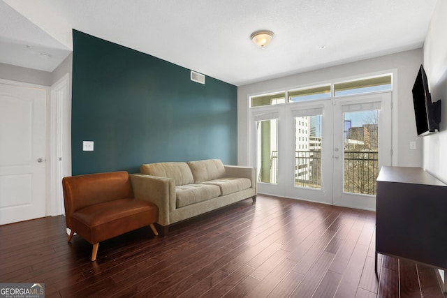 living room featuring dark hardwood / wood-style flooring