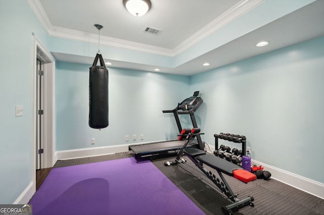 workout area with ornamental molding