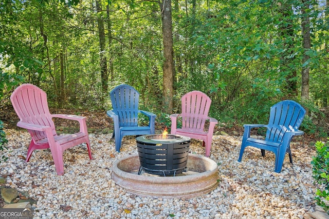 view of patio with an outdoor fire pit