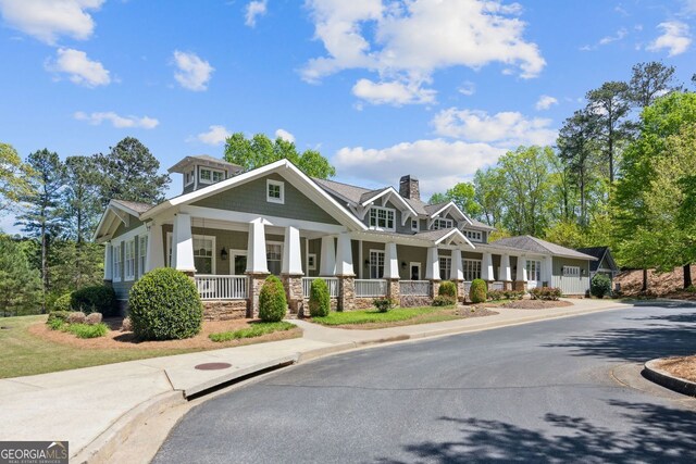 craftsman-style house featuring covered porch