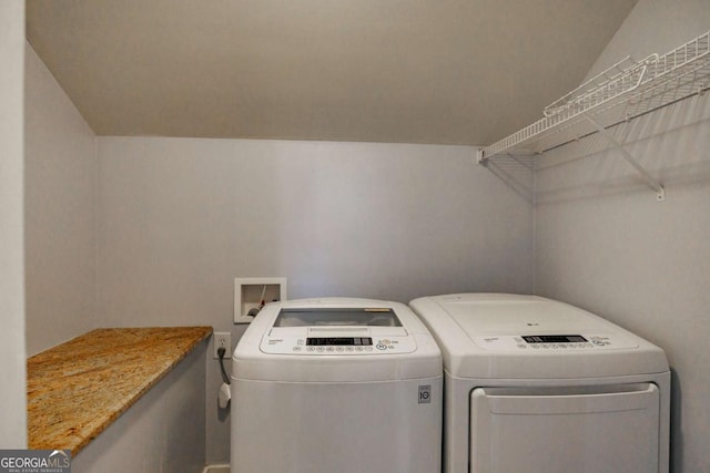 laundry room with separate washer and dryer