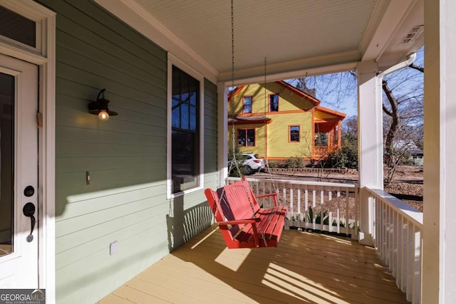 wooden deck with covered porch