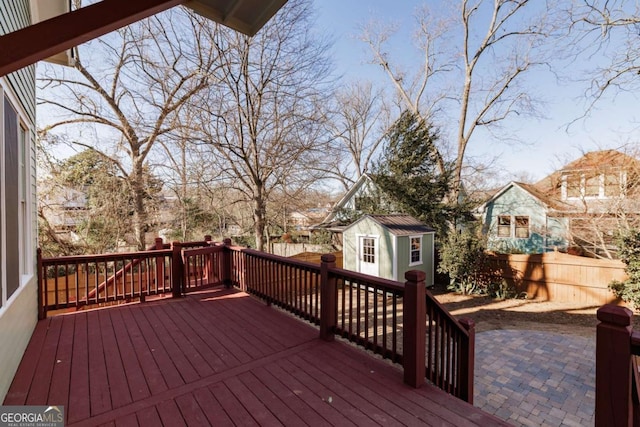 deck featuring a storage shed