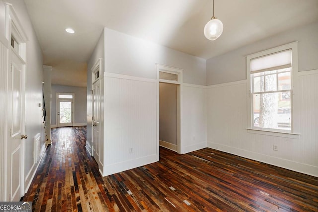 interior space with dark hardwood / wood-style floors