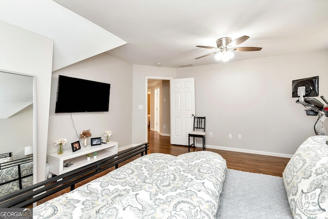 bedroom with hardwood / wood-style flooring and ceiling fan