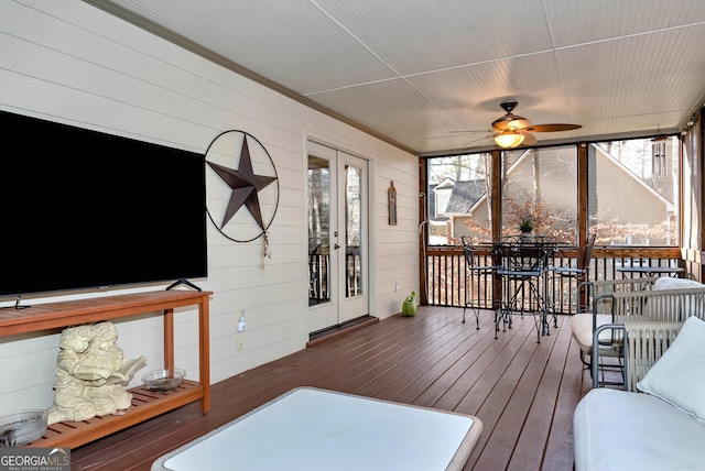 sunroom / solarium with ceiling fan