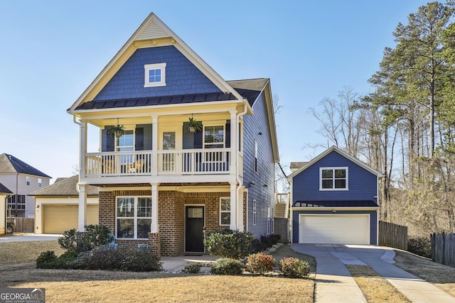 view of front of property featuring a garage and a porch