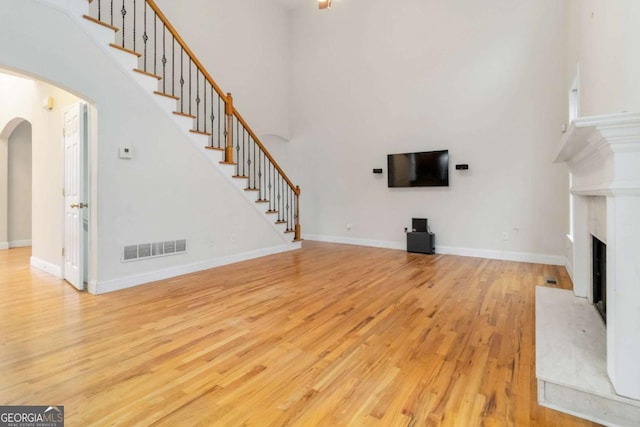 unfurnished living room featuring light hardwood / wood-style floors