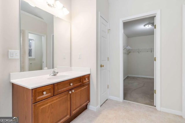 bathroom with vanity and tile patterned flooring