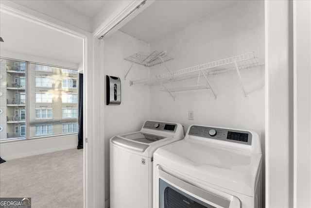 laundry area with carpet and independent washer and dryer