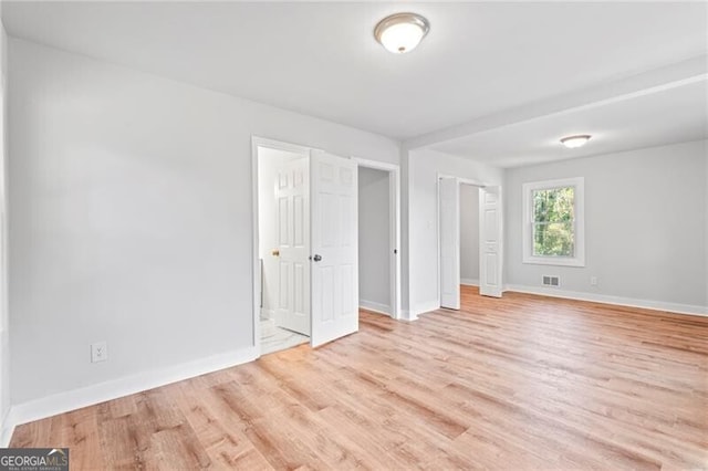 unfurnished bedroom with light hardwood / wood-style floors