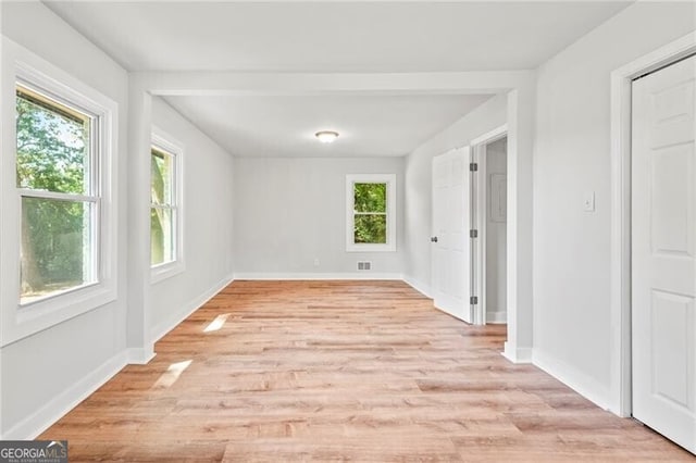 empty room with light wood-type flooring