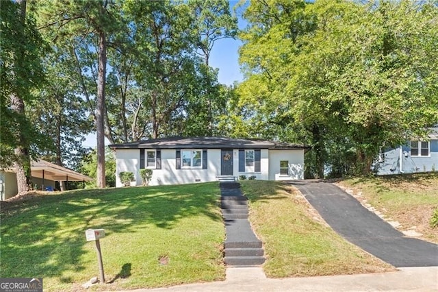 ranch-style house with a front yard