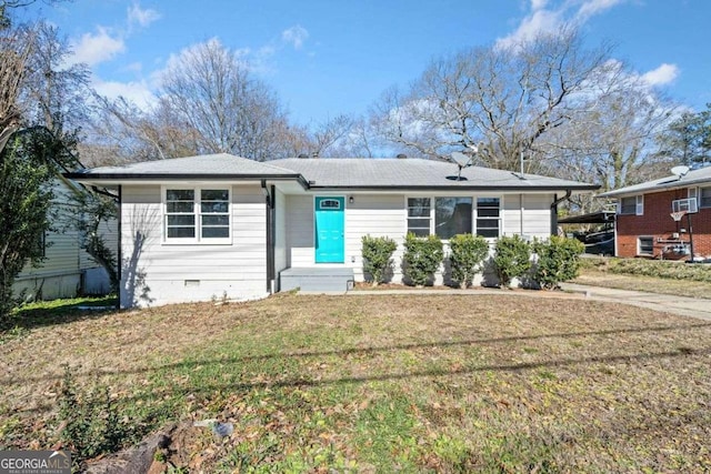 ranch-style house with a front yard