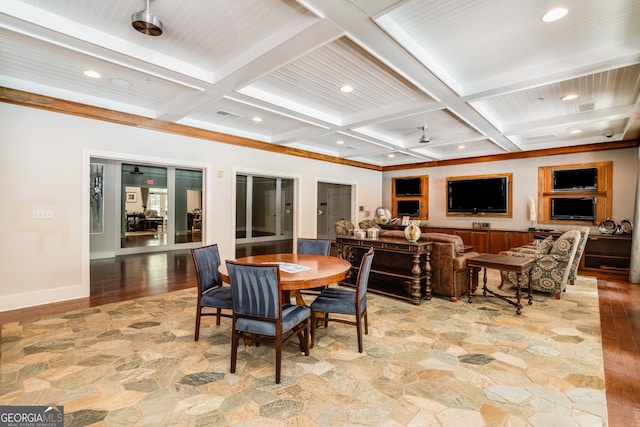 dining space with coffered ceiling and beam ceiling