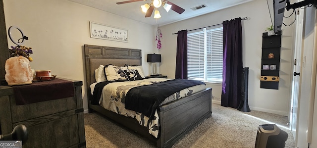 carpeted bedroom with ceiling fan