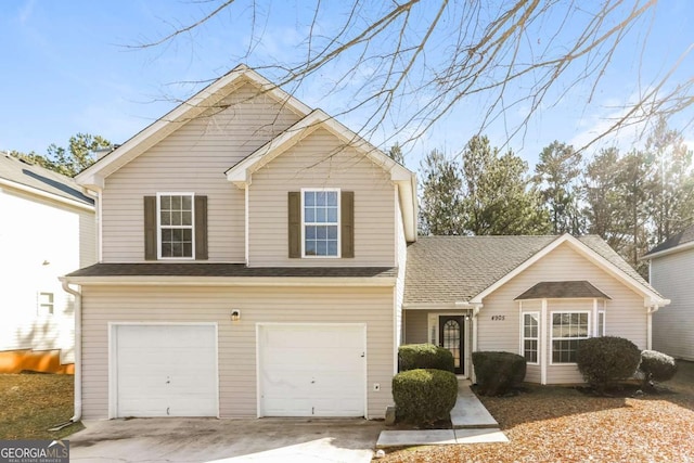 front facade with a garage