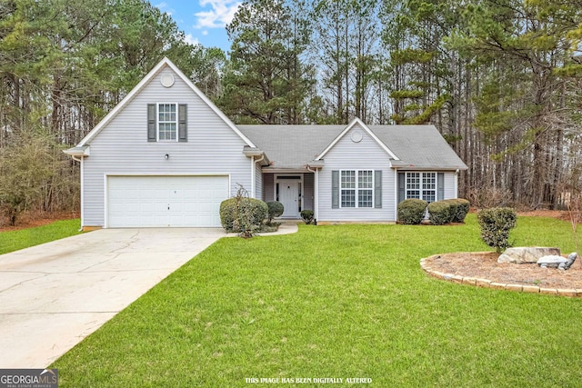 view of front facade with a garage and a front lawn