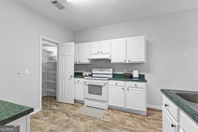 kitchen with white cabinetry, sink, a textured ceiling, and white appliances