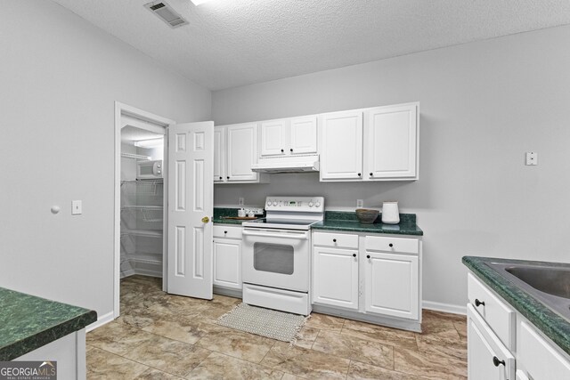 kitchen featuring white electric range, sink, a textured ceiling, and white cabinets